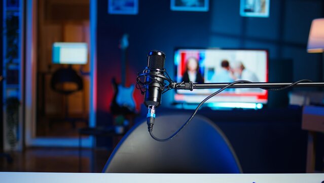 Panning shot of content creation recording mic in apartment