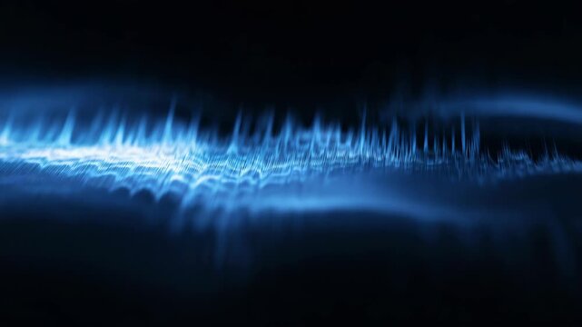 A grey metal surface in motion, creating a blur effect with blue electrical lines on it.