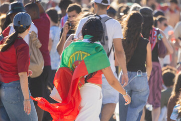 Naklejka premium Woman wearing portugal flag during football celebration rally