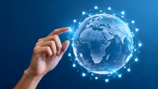 Hand touching digital globe with network