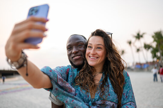 Celebrating inclusive love and global connection as a diverse couple shares their travel joy online