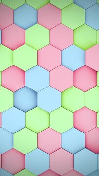 Abstract Pastel Colored Hexagon Grid Looping Background. 3D Rendered Moving Pink, Green, and Blue Geometric Pattern for Creative and Playful Concepts.