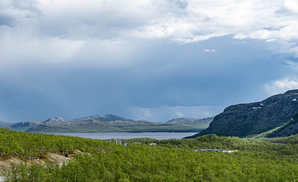 Moody dramatic clouds over Kilpisjarvi lake wilderness landscape in Finnish Lapland near Norway border