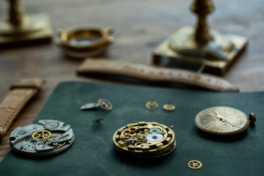 Traditional watchmaker workshop with vintage mechanical watches and tools