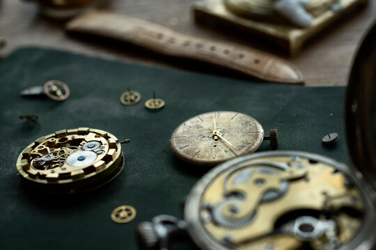Traditional watchmaker workshop with vintage mechanical watches and tools