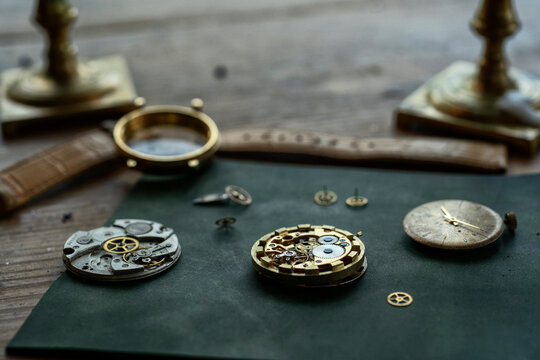 Traditional watchmaker workshop with vintage mechanical watches and tools