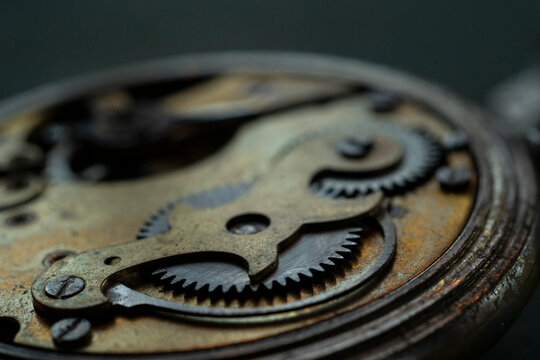 Watchmaker repairing vintage mechanical watches in an antique workshop