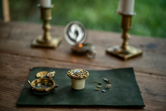 Traditional watchmaker workshop with vintage mechanical watches and tools