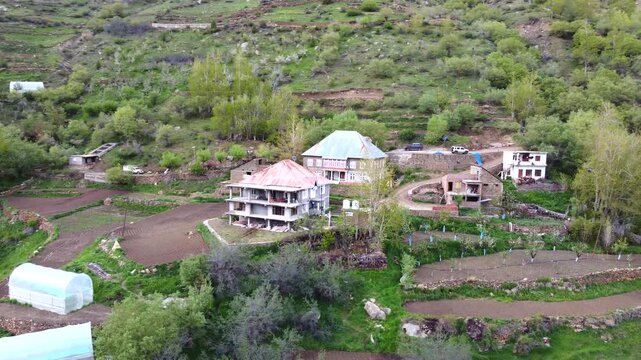 Mountain House Surrounded by Himalayan Mountain Peaks, India