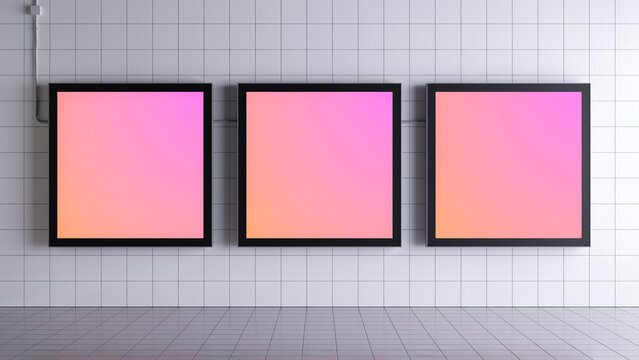 Three square lightboxes in matte black frames arranged in a row on a white square-tiled wall.