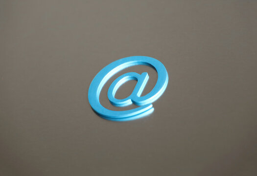 email symbol paperclips on iron plate background, concept of internet communication