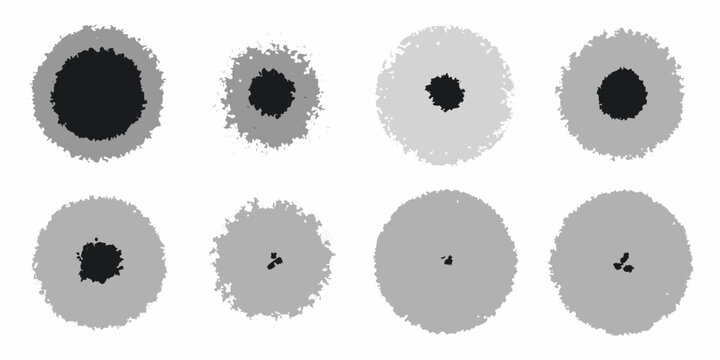 Spray paint grunge texture set with varying densities on a white background