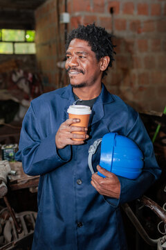 African worker having a coffee break