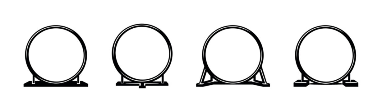 Collection of four different dog agility jump hoops with varied bases