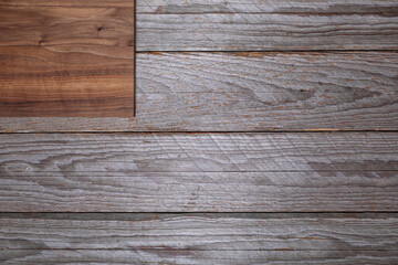 Fototapeta premium Dark Wooden Cutting Board on Rustic Gray Table, Top View Flat Lay, Surface for Creative Project Background 