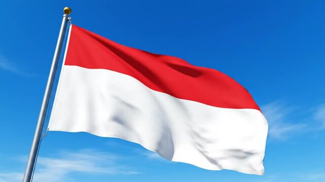National flag of Indonesia waving on flagpole against blue sky