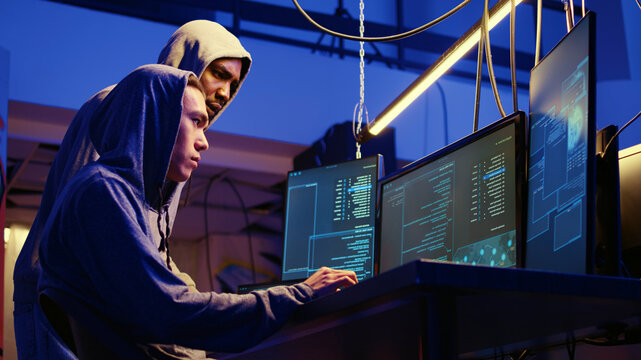 Hackers brainstorming ways of getting past anti tamper measures implemented by companies trying to protect their products, Crackers trying to pirate software and video game releases.