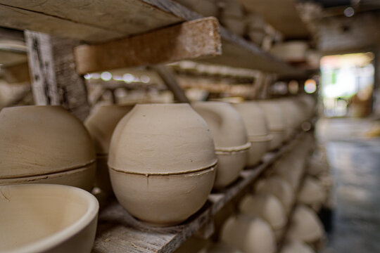 Many ceramic molds  on shelves in a warehouse in the city of Carmen de Vilboral, Colombia.