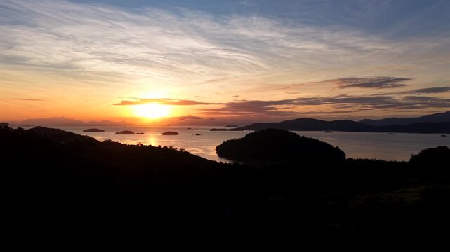 Soft Twilight Sky Over Sea and Mountains