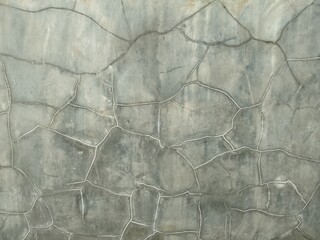 Fototapeta premium horizontal shot of cracked cement plaster wall background