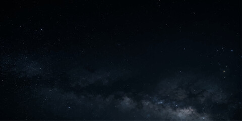 Cosmic Canvas: The Milky Way galaxy stretches across a dark night sky, dotted with countless stars, evoking a sense of wonder and the vastness of the universe. © Ruma