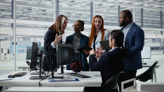 Engineering team prototyping semiconductor AI in office, brainstorming technical innovations, AI model and diverse coworkers in microchip factory R&D lab for semiconductor research.