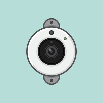 A modern security camera mounted on a flat light blue wall
