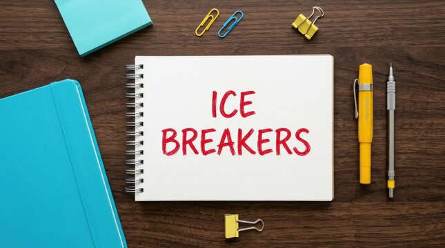 Ice breakers text written in red marker on a white spiral notebook on wooden table