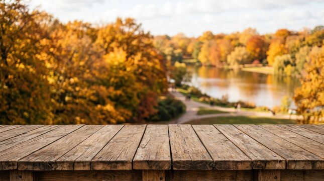 Wooden Table Overlooking Autumn River Landscape Scene.