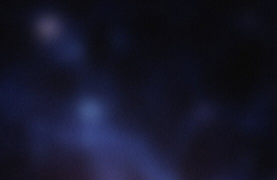 Misty dark night sky with faint light source
