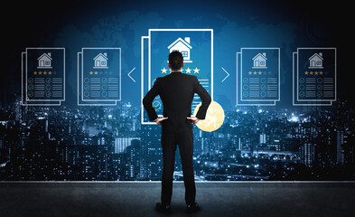 Fototapeta premium A businessman analyzes real estate data displayed on a digital screen. The city skyline at night serves as a backdrop, symbolizing opportunity and growth in the finance sector. Ledger