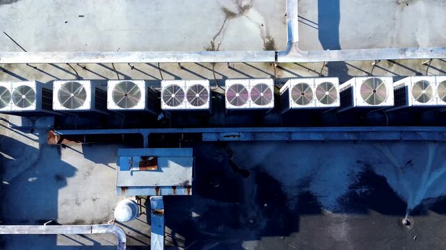 Top Down Drone View of Rooftop Air Conditioning Units on Industrial Building, Urban Infrastructure, Mechanical Ventilation Pattern and Technology Background