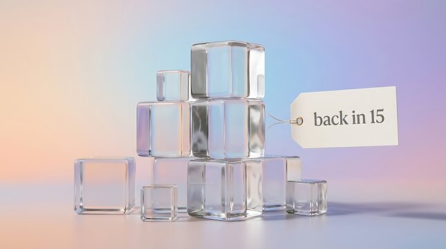 A 15 minite break concept featuring a stack of clear glass cubes with a paper price tag hanging on a soft pastel gradient background for office use