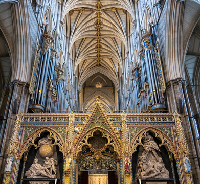 Ornate choir screen and organ pipes in Westminster Abbey, London