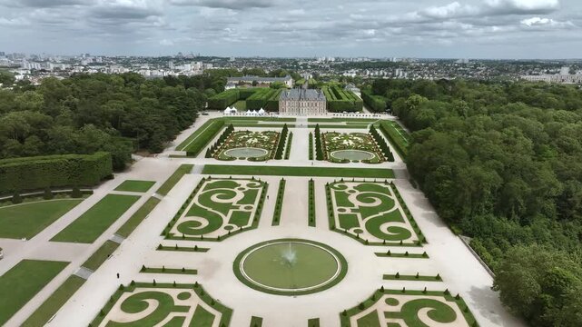 Domaine Departemental de Sceaux chateau and formal gardens aerial view on a cloudy day