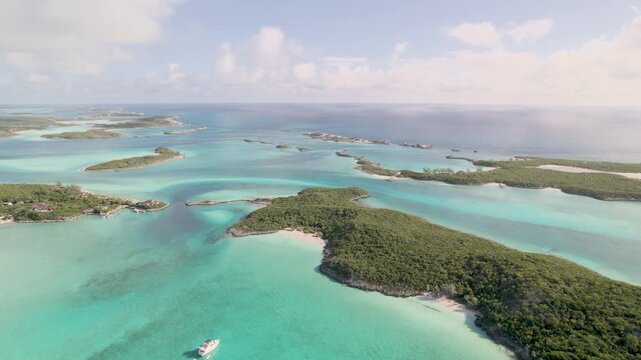 Aerial drone panorama of the Exuma Cays with turquoise lagoons, tropical islands, and crystal clear waters in the Bahamas