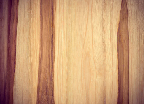 Natural light brown wood texture background, smooth wooden board surface.