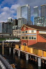 Fototapeta premium Seattle waterfront showing Pier 55 and city Argosy private cruise docks