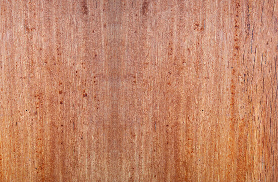 Natural reddish brown hardwood texture background, polished wooden board