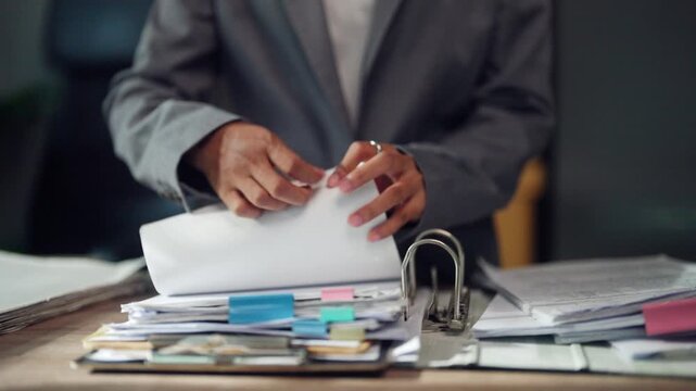 Office Employee Organizing Corporate Records