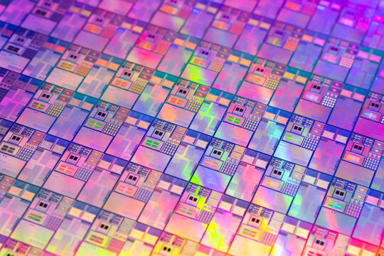 Macro background of silicon wafer semiconductor with neon color, integrated circuits to manufacture CPU and GPU