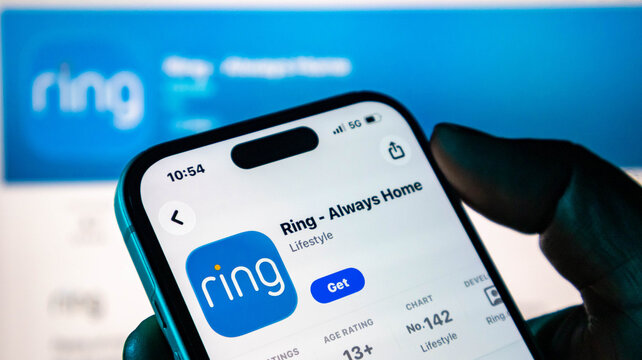 Closeup of a smartphone screen showing the ring home security app download page in an app store