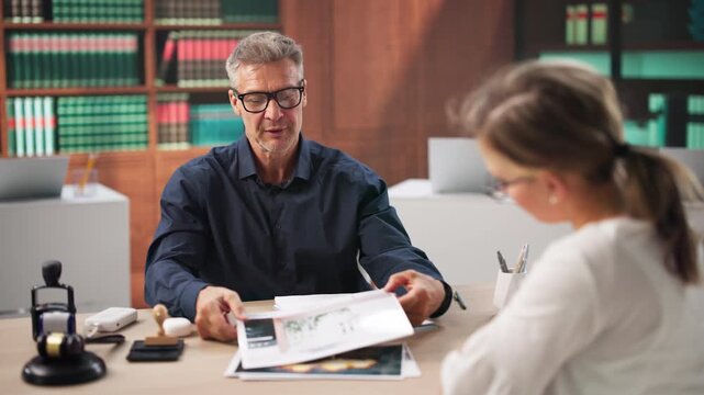 Insurance Adjuster Carefully Reviews Damage Report