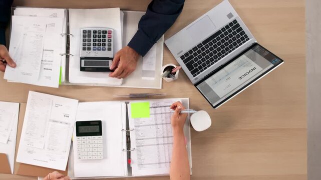 Accountant Carefully Reviews Receipts