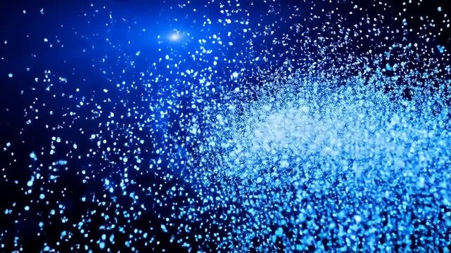 Blue glowing particles in dark space