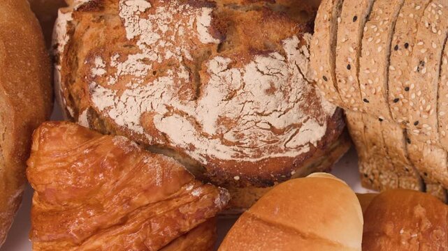 Assorted Fresh Bakery Bread and Pastries Close Up Zoom Out