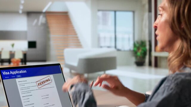 Anxious Visa Applicant Checking Real-time Status Updates