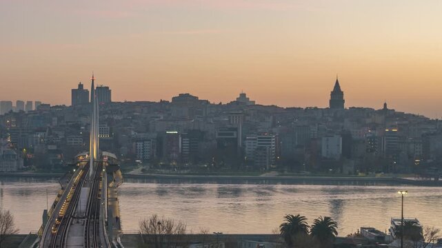 Istanbul Turkiye (Turkey) time lapse sunrise city skyline at Galata Tower Golden Horn and Halic bridge