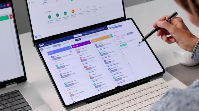 Human Resources Manager Reviewing Candidate Profiles During Online Interview