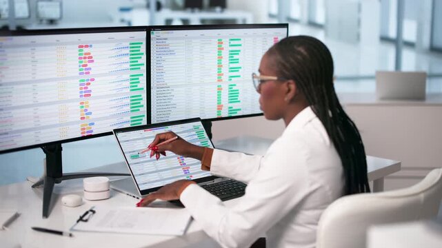 Medical Billing Specialist Carefully Reviews Healthcare Invoice
